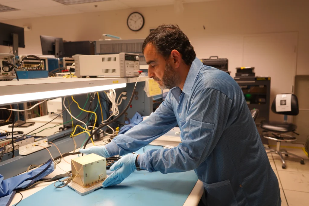 Munther Hassouneh, the NavCube3-mini project manager, in the Space Navigation Laboratory at NASA’s Goddard Space Flight Center in Greenbelt, Md. (Credit: NASA/Dave Ryan)